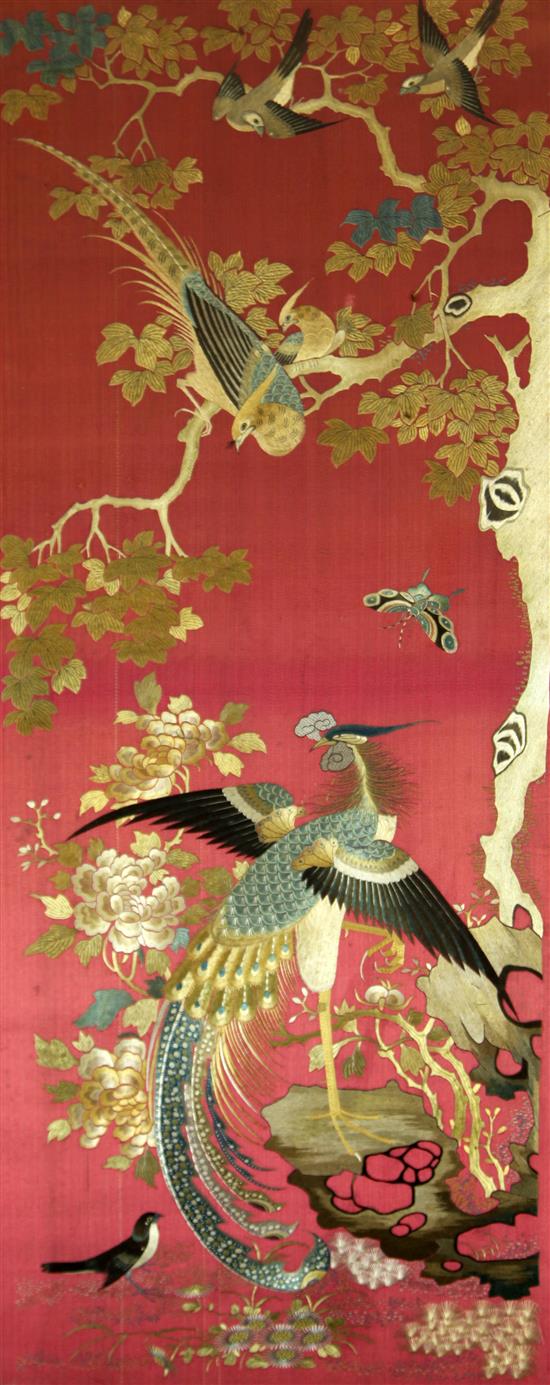 A Chinese embroidered silk bird panel, 101 x 44cm, framed